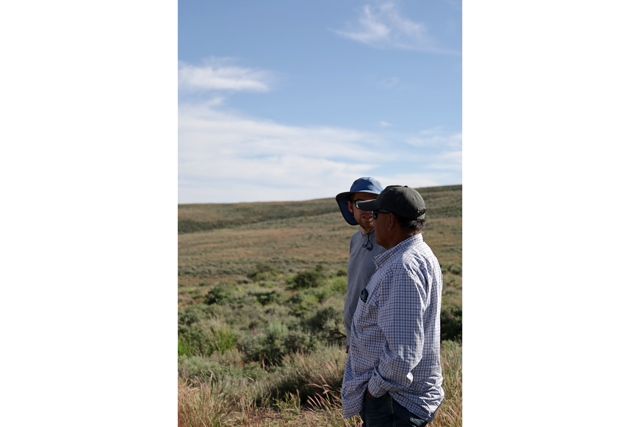 Myron Smart talks to Nate in the McDermitt Caldera in June 2024. Photo by Jessica Ng.
