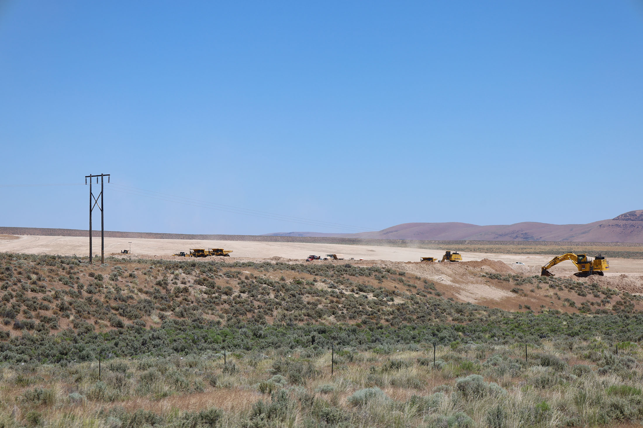Bulldozers clear sagebrush and level the ground for the construction of the Thacker Pass Lithium Mine in June 2024. Photo by Jose Santacruz.