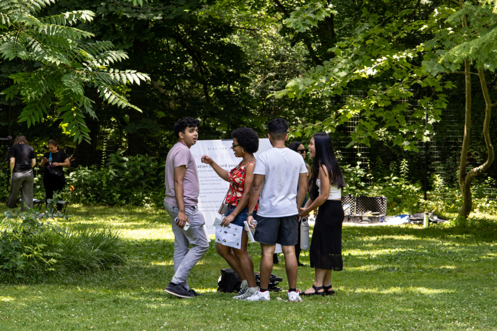 Visitors explore Blue Lab's Popup Story Patch at Morris Arboretum & Gardens