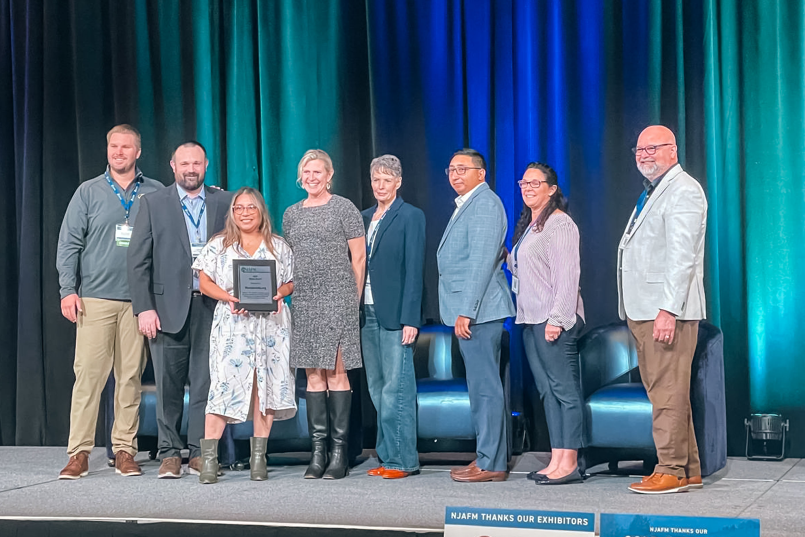 Asela Perez-Ortiz and Allison Carruth accept the NJAFM Media Award for Carried by Water