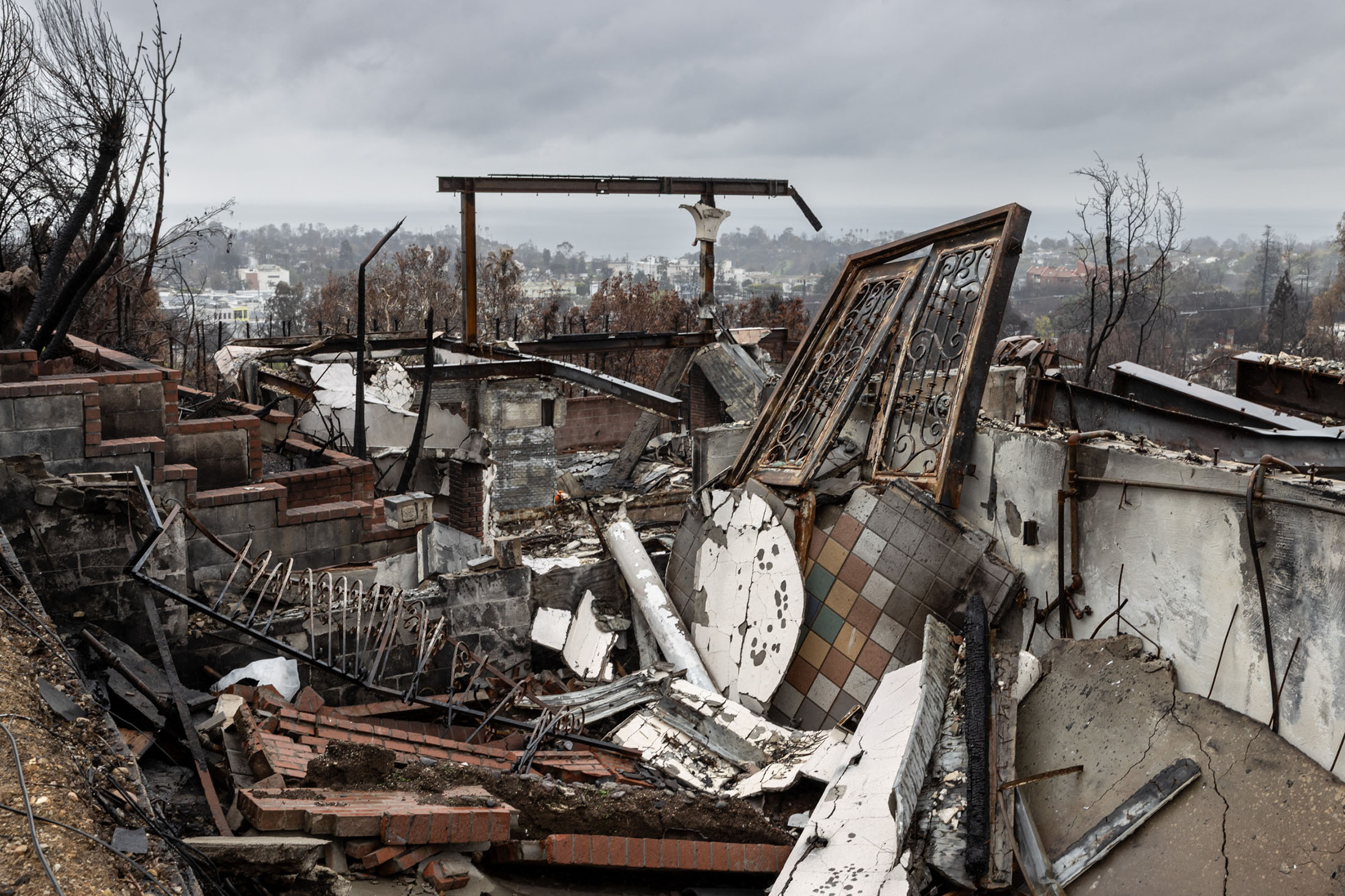 The wreckage of a burned property in the Pacific Palisades